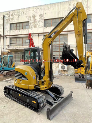 Маленькая машинная мини-экскаватор CAT 304 в хорошем состоянии