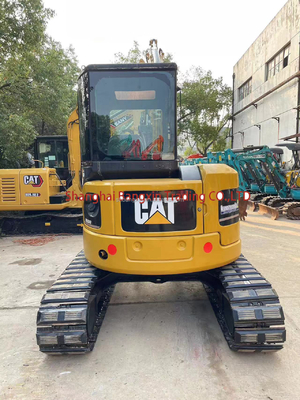 Маленькая машинная мини-экскаватор CAT 304 в хорошем состоянии