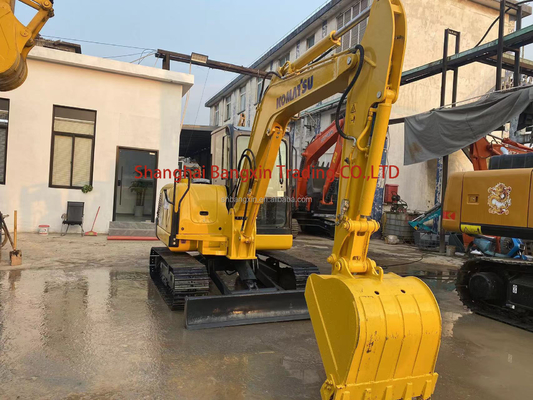 Использованный экскаватор Komatsu PC56 вместимостью 0,25 ведра и массой 5600 кг