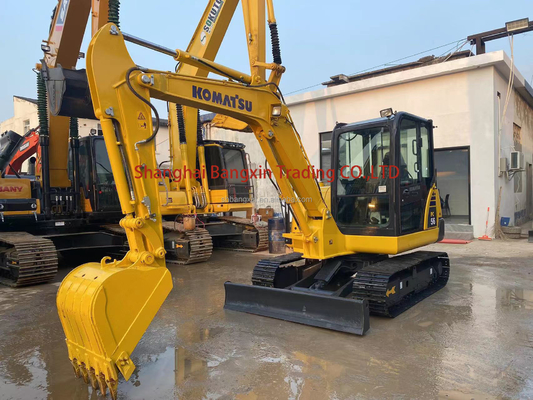 Использованный экскаватор Komatsu PC56 вместимостью 0,25 ведра и массой 5600 кг