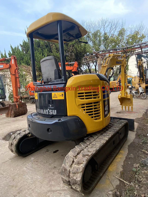 Торговый экскаватор Komatsu PC40MR-3 с емкостью 0,19 ведра и весом 4000 кг